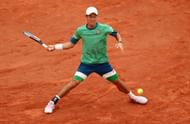 Kei Nishikori in action against Henri Laaksonen in the third round of Roland Garros 2021